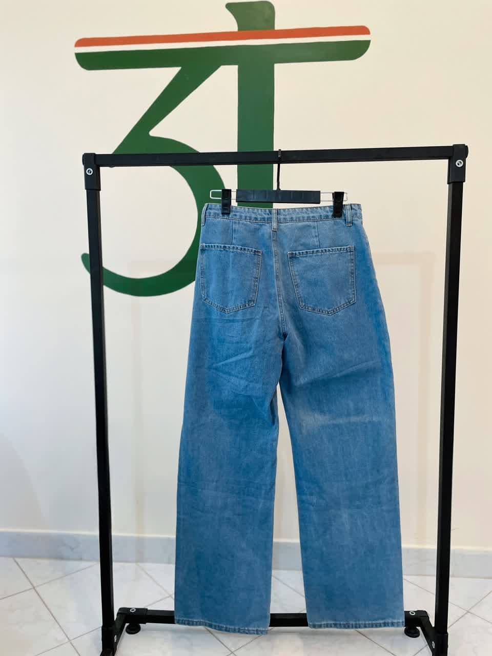 شلوار جین زنانه واید لگ دکمه‌دار آبی روشن برند شین