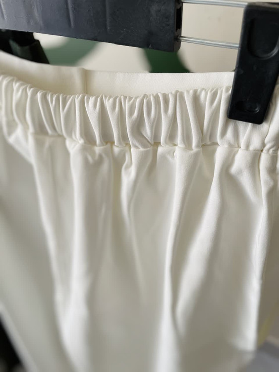 شلوار پارچهای زنانه فاقبلند با دیزاین کمربند کراسی